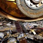 fake watches being crushed