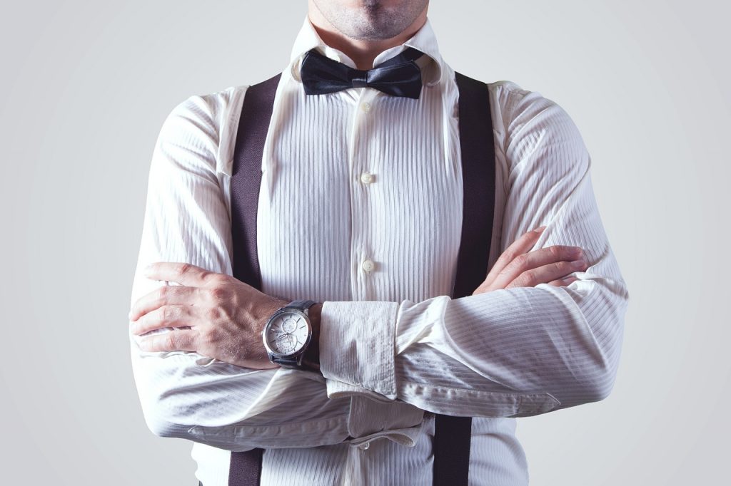 man in suspenders