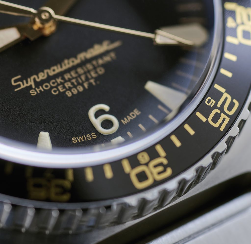 gilt black dial